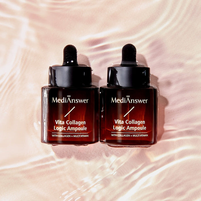 Two bottles of MEDIANSWER Vita Collagen Logic Ampoule skincare product with droppers, placed on a textured surface.