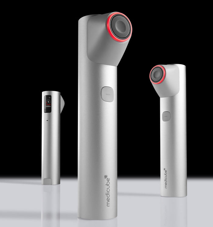 Three MEDICUBE AGE R High Focus Shot devices with sleek silver design and red accents displayed on a reflective surface.