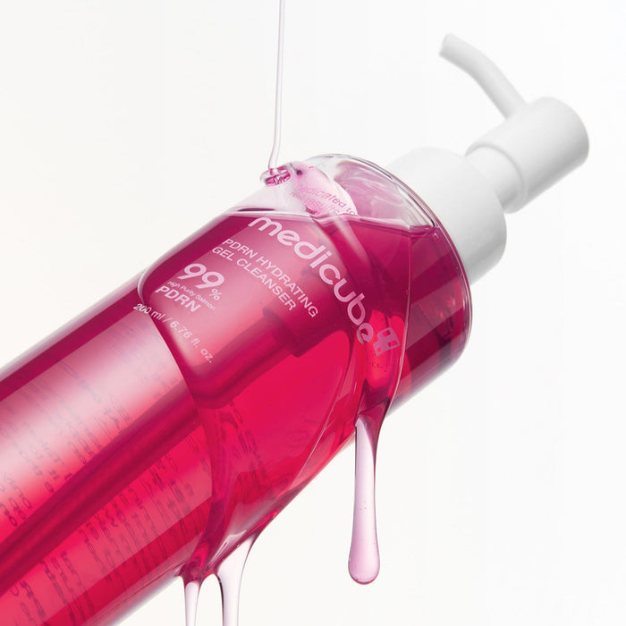 MEDICUBE PDRN Gel-To-Foam Cleanser 200ml bottle with pink liquid, angled view, emphasizing product design and bottle features.