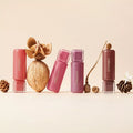MILK TOUCH Jelly Fit Tinted Glow Tint products displayed with natural elements like pinecones and dried flowers.