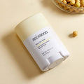 MIXSOON Bean Sun Stick with SPF 50+, featuring natural ingredients for sun protection, displayed on a beige background with beans.