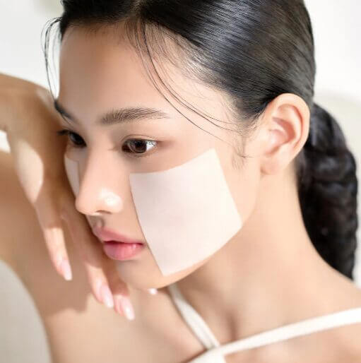 Woman using MIXSOON Bifida Toner Pad on face for skincare.
