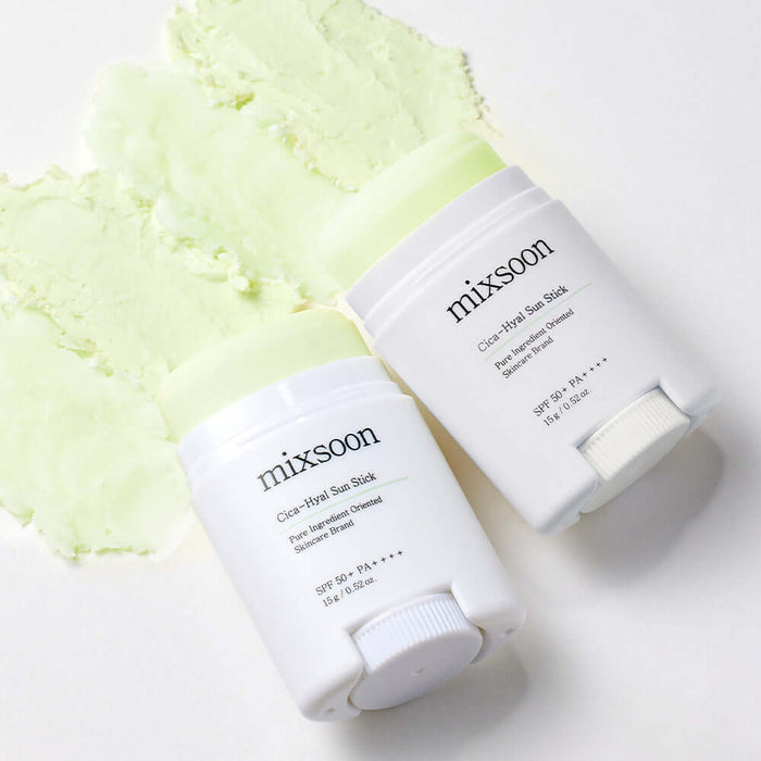 MIXSOON Cica Hyal Sun Stick displayed on green texture background, highlighting its SPF protection and soothing properties.