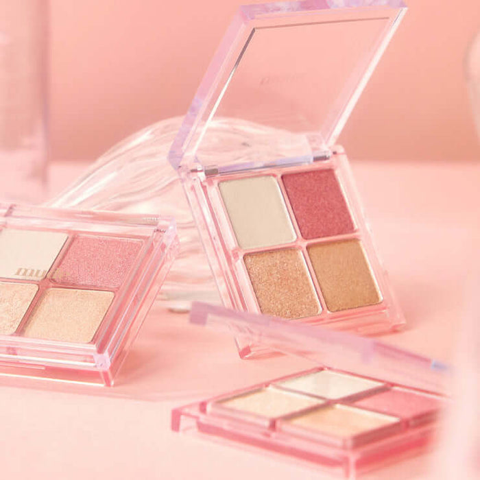 MUDE Full bloom Glow Palette showcasing open palette with pink and gold shades for a radiant glow effect.