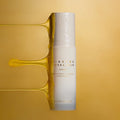 NATURE REPUBLIC Ginseng Royal Silk Essence 40ml product bottle with shimmering background