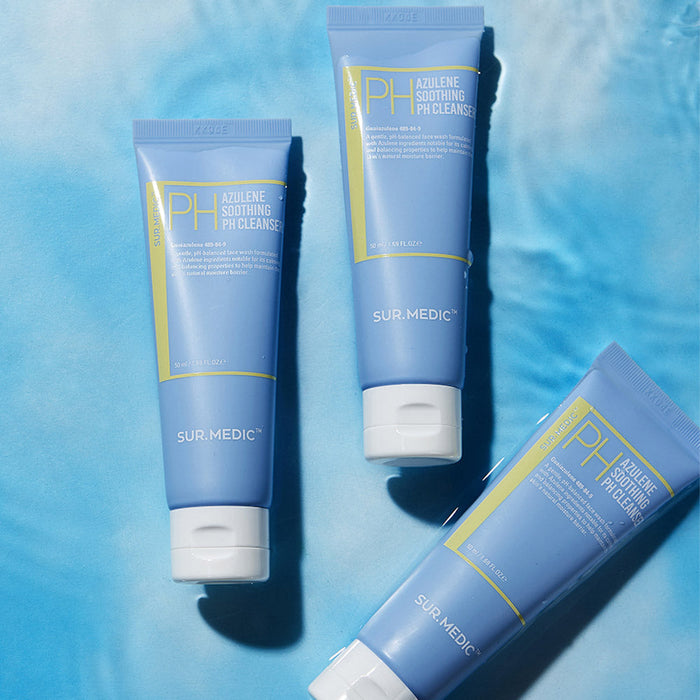 Three blue tubes of NEOGEN Azulene Soothing Midly Acidic Cleanser 150ml placed on a blue surface.