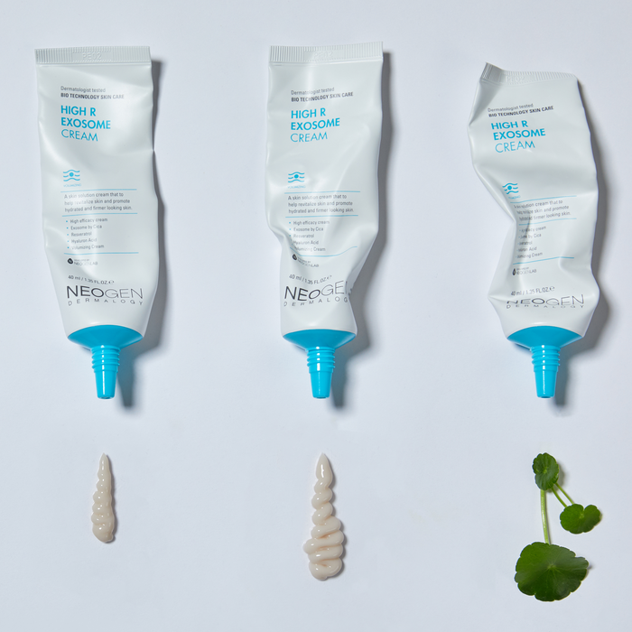 Three tubes of NEOGEN Hyal Exosome Cream 40ml dispensed on white surface, enhancing skin texture.