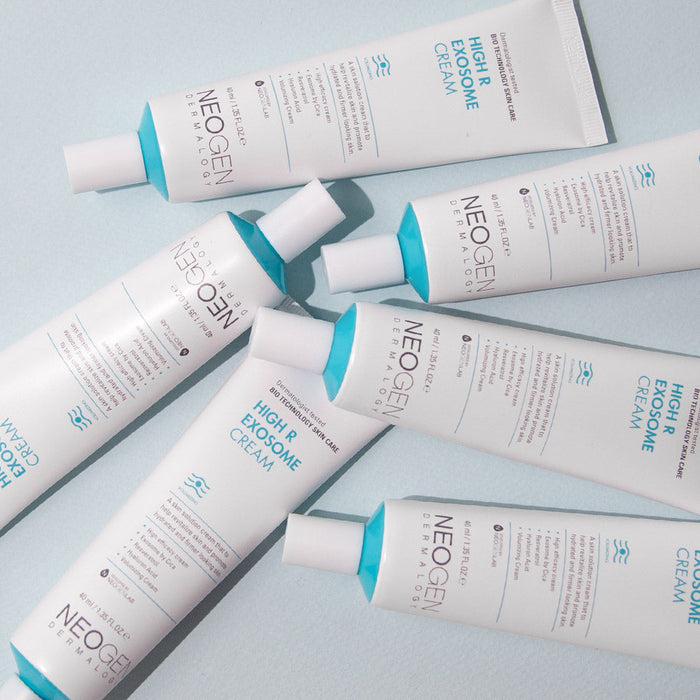 Six tubes of NEOGEN Hyal Exosome Cream 40ml arranged on a flat surface, highlighting skincare packaging.