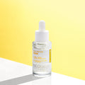NEOGEN Real Peptide Serum 30ml, anti-aging skincare serum with peptides, on a bright yellow and white background