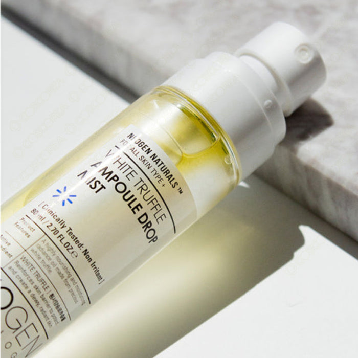 NEOGEN White Truffle Ampoule Drop Mist 80ml bottle on a table.