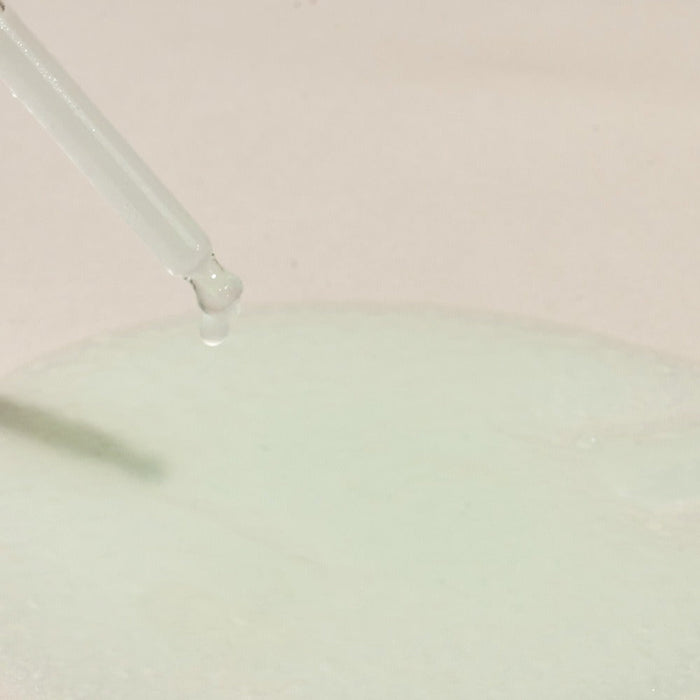 Close-up of NUTSELINE Cica Nut Hyal Ampoule 90ml serum with dropper showcasing texture