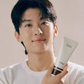 Gentleman Korea model holding OBGE Multi-texture curl cream 150ml tube for men’s styling and Korean grooming
