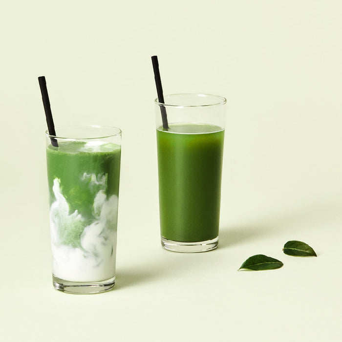 Two refreshing matcha drinks made with OSULLOC Matcha Sticks 5 p, featuring vibrant green color and creamy texture in tall glasses.