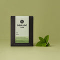 OSULLOC Sejac Tea 10p box with green tea leaves on a light green background.