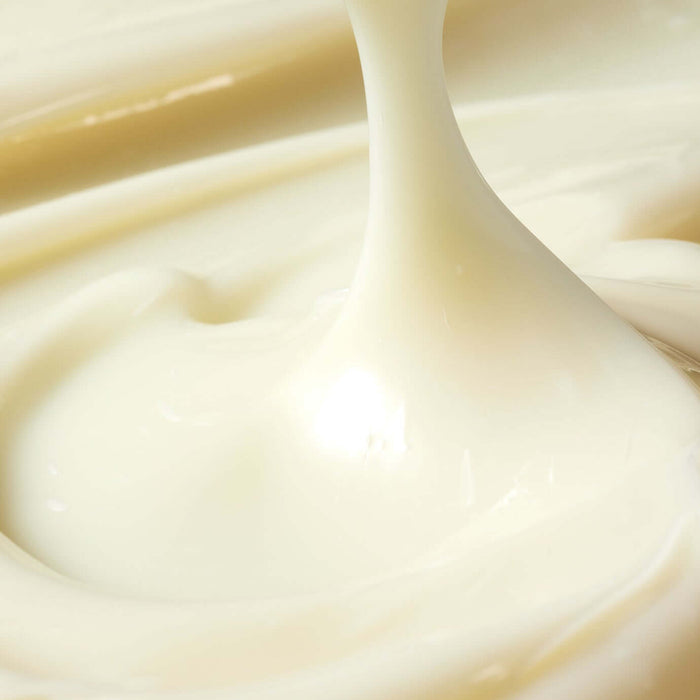 Texture of PARNELL Bakuchiol Retinol Wild Yam Firming Cream 50ml with creamy consistency shown up close.