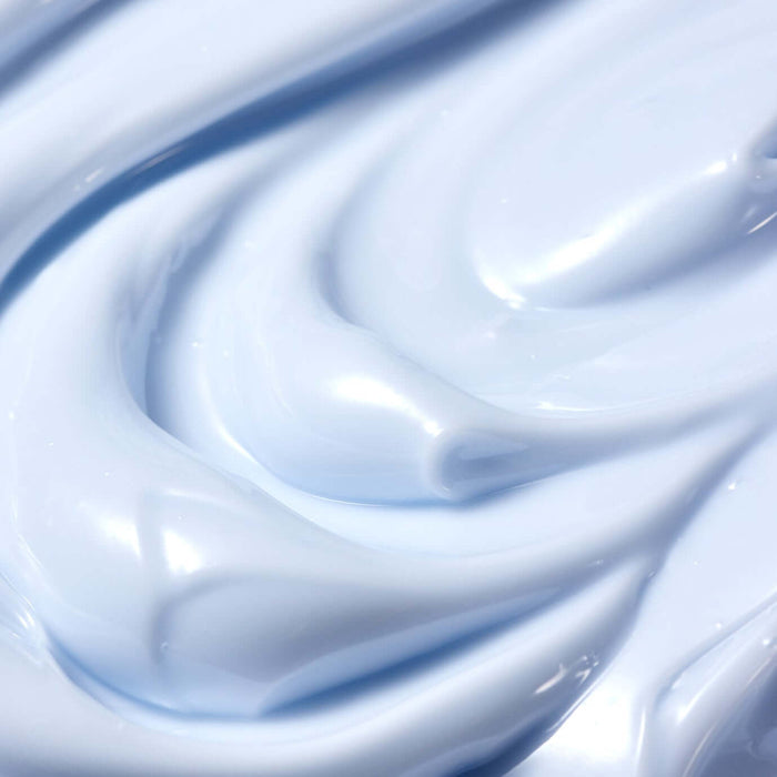 Texture of PARNELL Squalane 15.13 Mineral Water Moisture Cream 50ml showing a smooth, creamy consistency in a light blue shade.