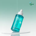 PASSION&BEYOND Angel Tea Tree 10% Trouble Ampoule 50ml bottle on display with vegan logo.