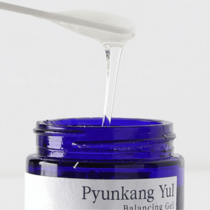 PYUNKANG YUL Balancing Gel 100ml in blue jar with gel being poured from a spoon.