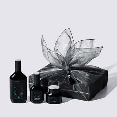 PYUNKANG YUL Black Tea Bojigi Gift Set with luxurious black packaging and skincare products.