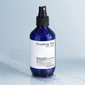 PYUNKANG YUL Mist Toner 200ml bottle with water droplets on a smooth surface.