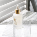 R828 Super Repair Serum 50ml bottle on a white background with a dropper, highlighting its anti-wrinkle and moisturizing benefits.