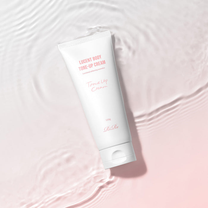 RIRE Lucent White Tone-Up Cream showcased on a soft pink water ripple background.