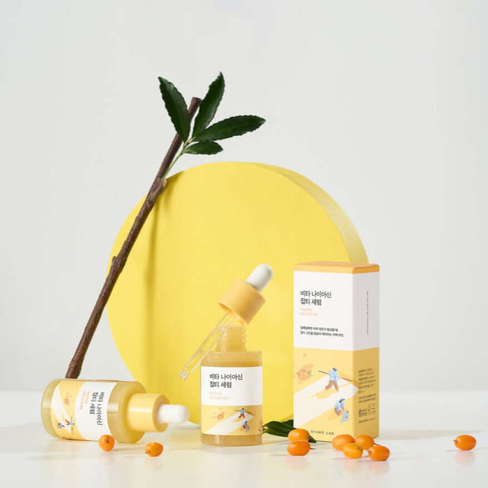 ROUND LAB Vita Niacin Spot Serum 30ml bottle and packaging with natural accents