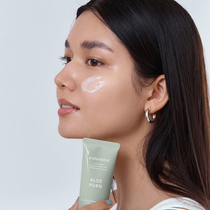 Woman applying SHAISHAISHAI [1+] Aloe PDRN Cooling Repair Cream 50ml on face