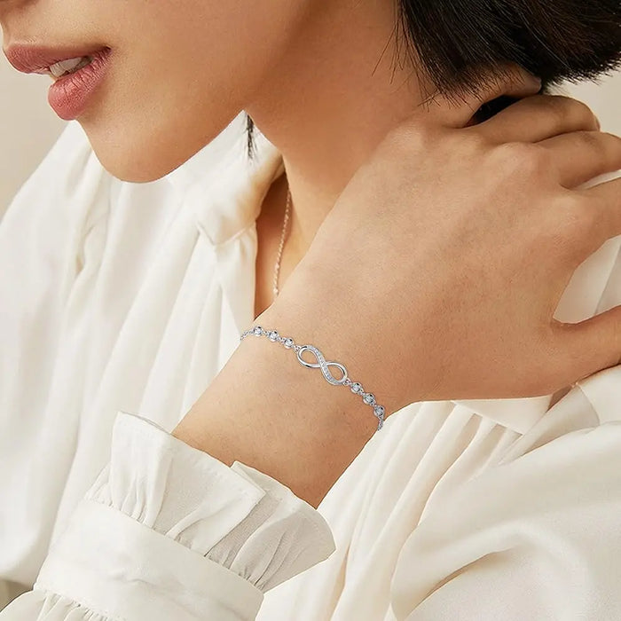 Silver-tone infinity bracelet with cubic zirconia accents - BELARIC
