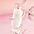 SKIN1004 Madagascar Centella Poreizing Velvet Finish Sunscreen 50ml displayed in a pink background with a decorative design.