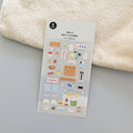 Sheet of SUATELIER Bathhouse Stickers with various bath-themed designs lying on a towel.