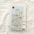 Image featuring SUATELIER Save The Earth Stickers sheet with various eco-friendly designs.