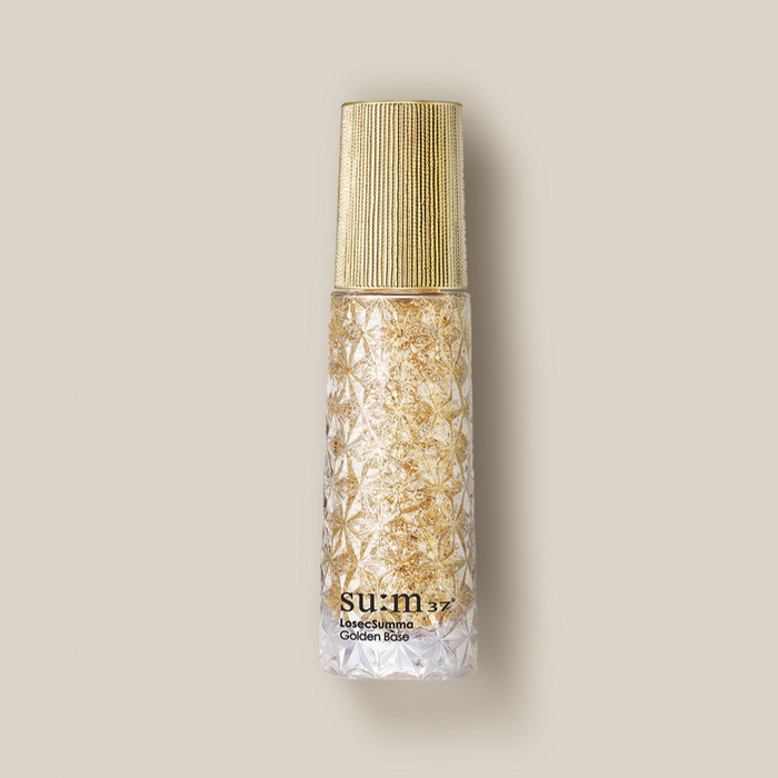 Bottle of SU:M37 Rosicsumma Golden Base 30ml with golden lid and intricate design.