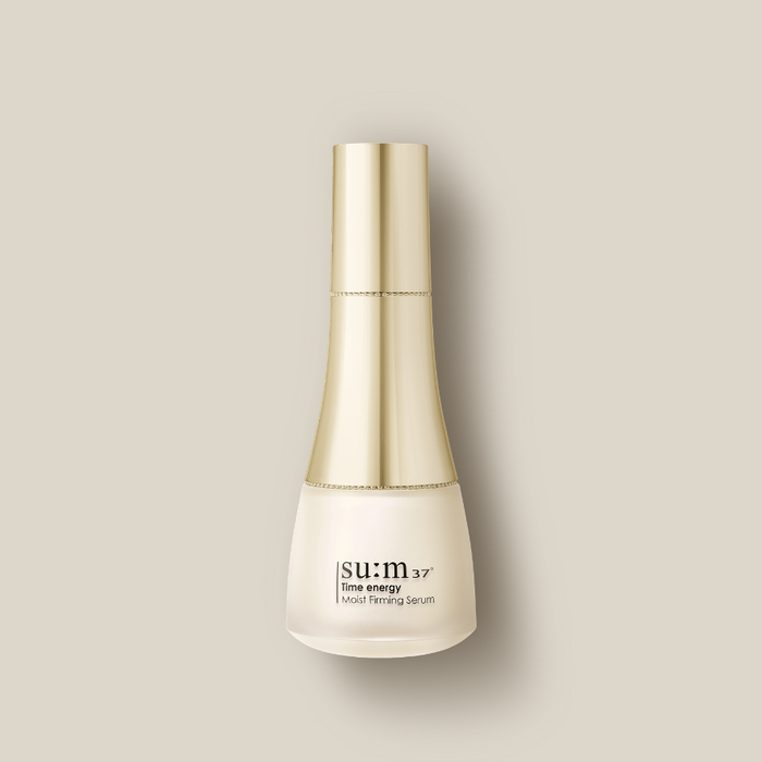 SU:M37 Time Energy Moist Firming Serum 50ml in elegant gold bottle on neutral background