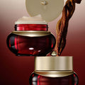 THE WHOO Jin Yul Hyang Anti-Wrinkle Enriching Cream 50ml in a luxurious red jar with gold accents, open to show cream texture.
