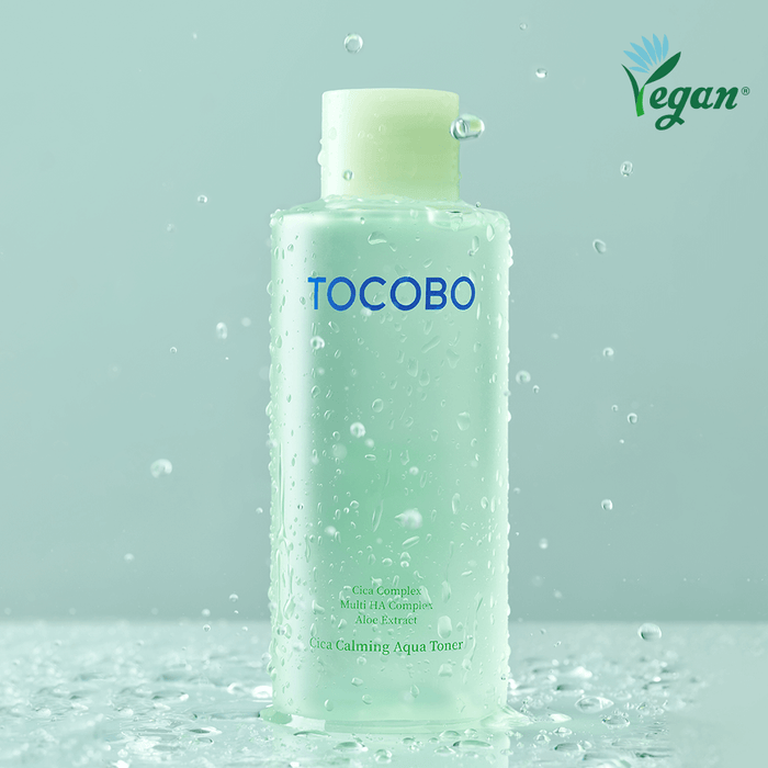 TOCOBO Cica Calming Aqua Toner vegan skincare product in a clear bottle with water droplets.