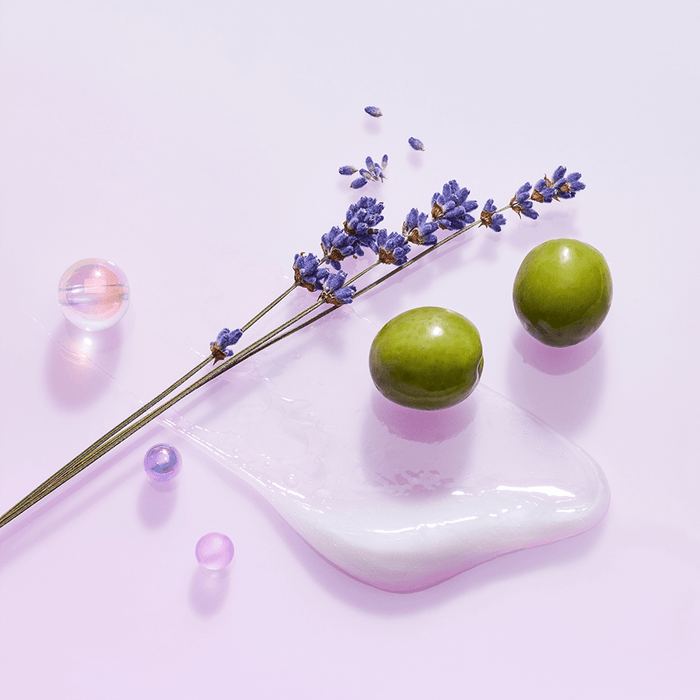 TOCOBO Collagen Boosting Lip Mask ingredients including lavender and natural elements on a pastel background.