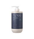 Bottle of TONYMOLY Tune 9 Wow Refreshing Shampoo 1000g with label and pump dispenser.