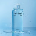 TORRIDEN Dive In Low Molecular Hyaluronic Acid Toner 300ml bottle with blue liquid on blue background