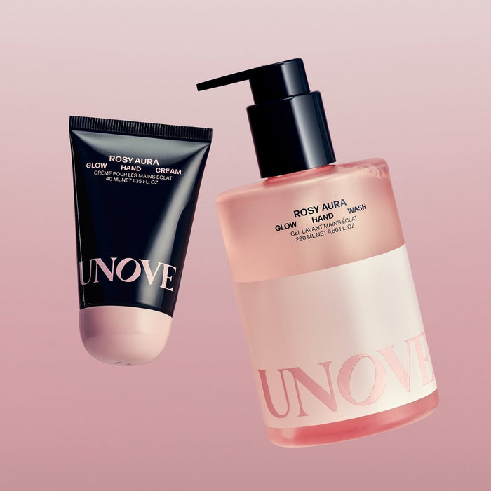 UNOVE Glow Hand Wash 290ml bottle with hand cream on pink background