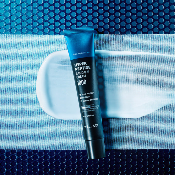 WELLAGE Hyper Peptide Bandage Cream 50ml tube on textured background, showcasing skincare product.